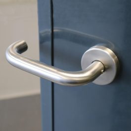 return to door lever handle